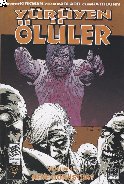 Yürüyen Ölüler Cilt 10 - Neye Dönüştük | Marmara Çizgi | Charlie Adlard | Robert Kirkman |  |  |  | 9789756129562